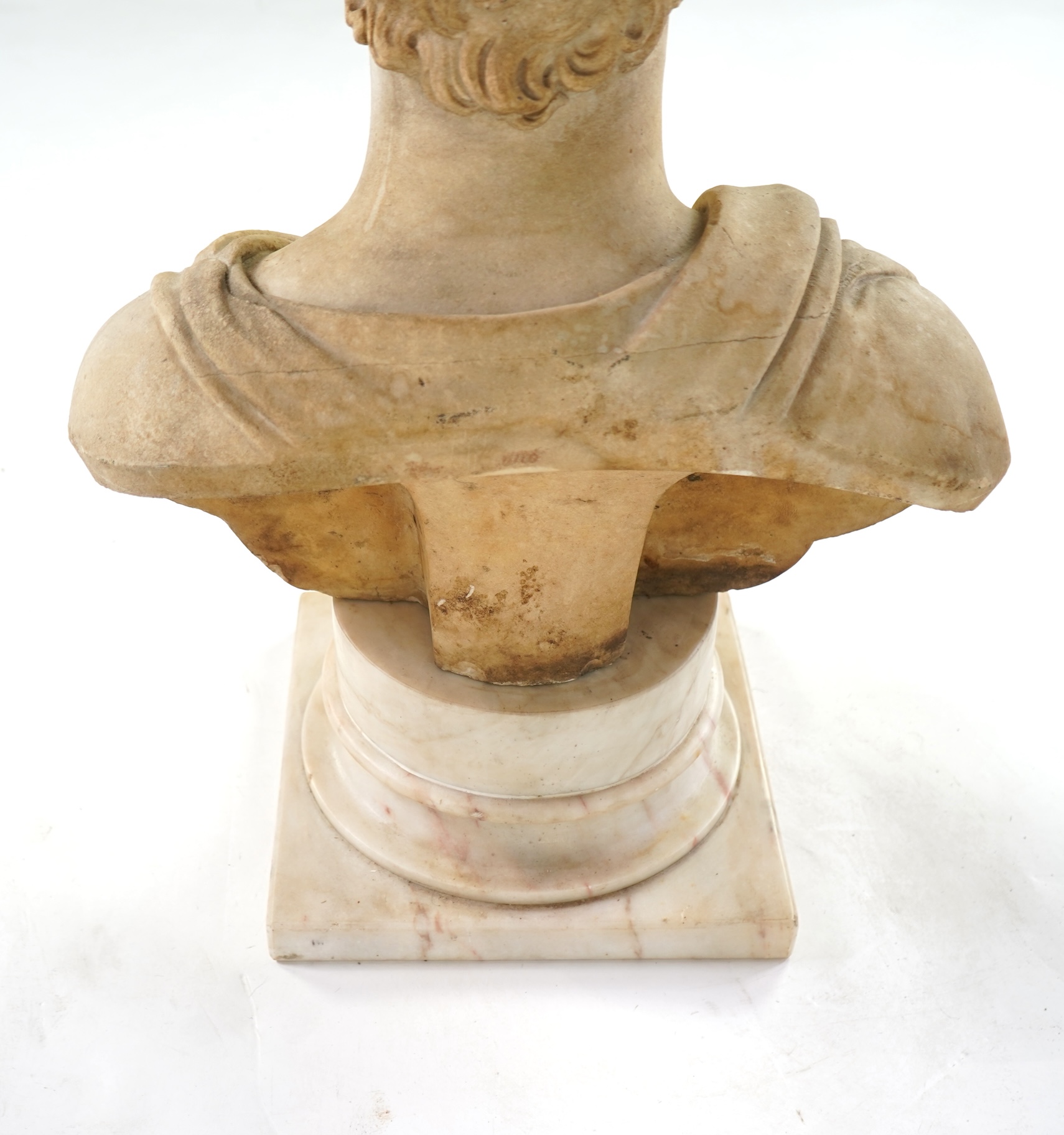 A neoclassical life size marble bust of a gentleman, early 19th century